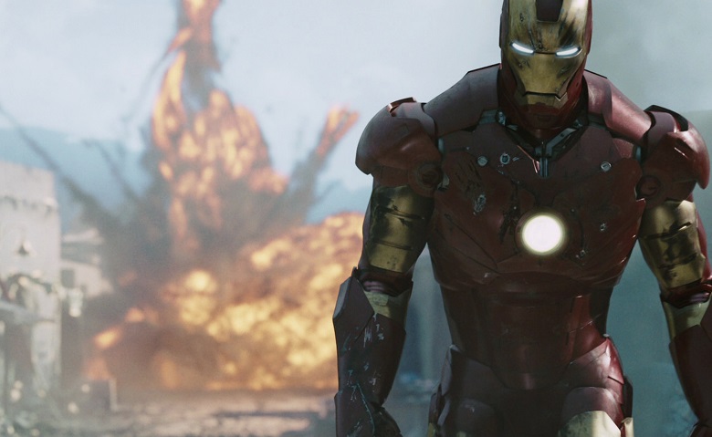 Iron Man walking away from an explosion